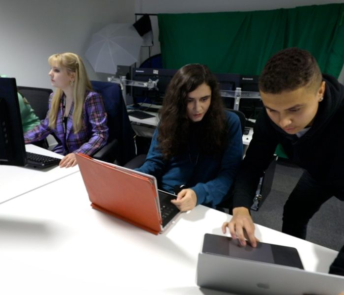 Group of students working together at BNU based at Pinewood Studios